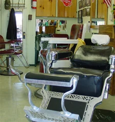 Inside The Barber Shop in Long Beach — original early-1900s barber chairs and vintage fittings